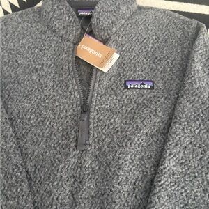 Patagonia women’s Zip-Up Sweater in Heather Gray